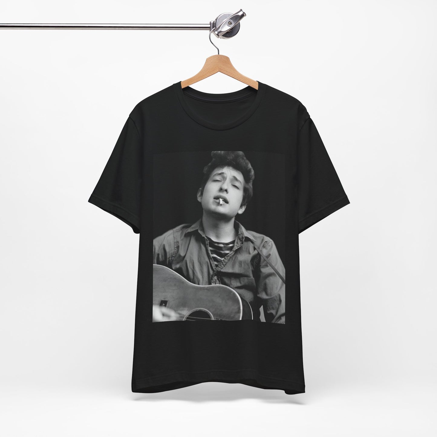 A black graphic t-shirt featuring a photo of Bob Dylan with his acoustic guitar.