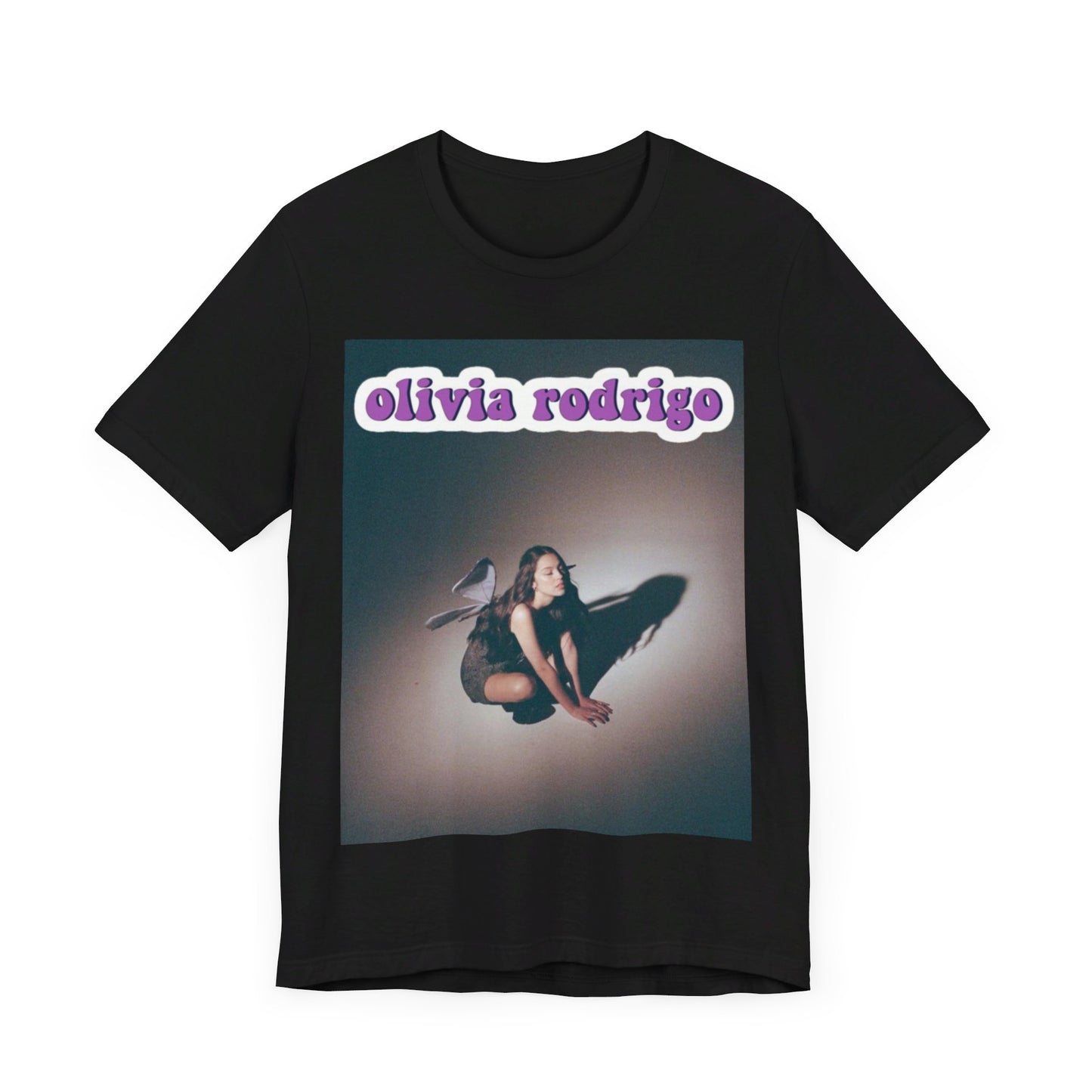 A black graphic t-shirt featuring a cool indie pop princess graphic of Olivia Rodrigo.