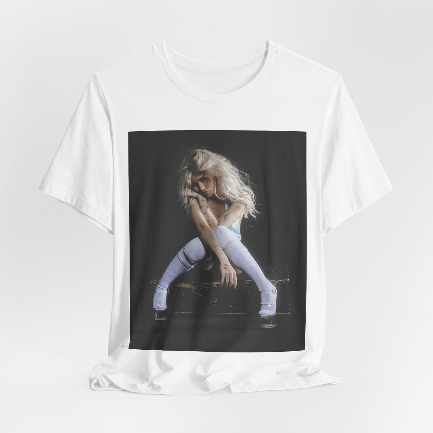 A black graphic t-shirt featuring a graphic of Nessa Barrett with dark pop vibes aesthetic.