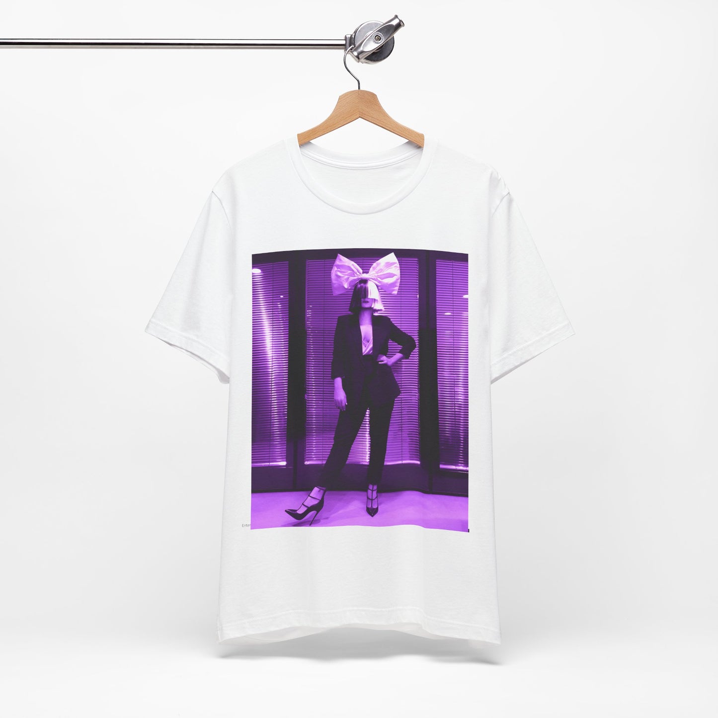 A black graphic t-shirt featuring a vintage pop diva graphic of Sia.