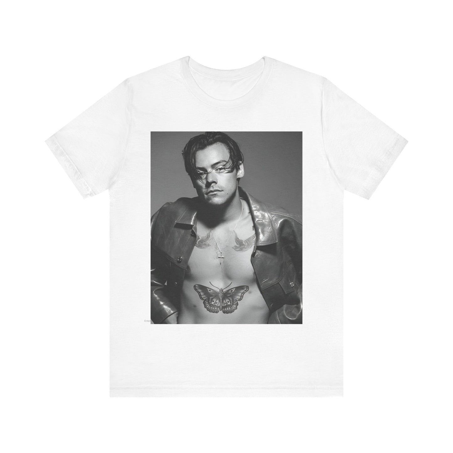 A black graphic t-shirt featuring a black and white portrait photo of Harry Styles.