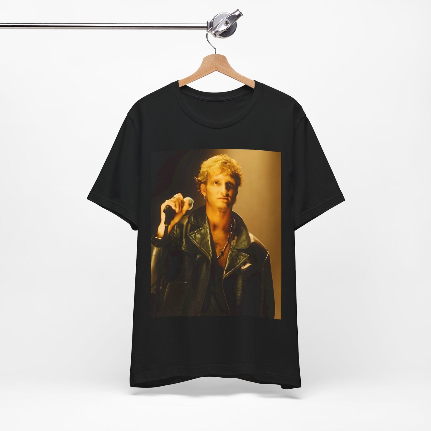 A black graphic t-shirt featuring a vintage 90s grunge-style graphic for Alice In Chains, possibly with band members or stylized elements.
