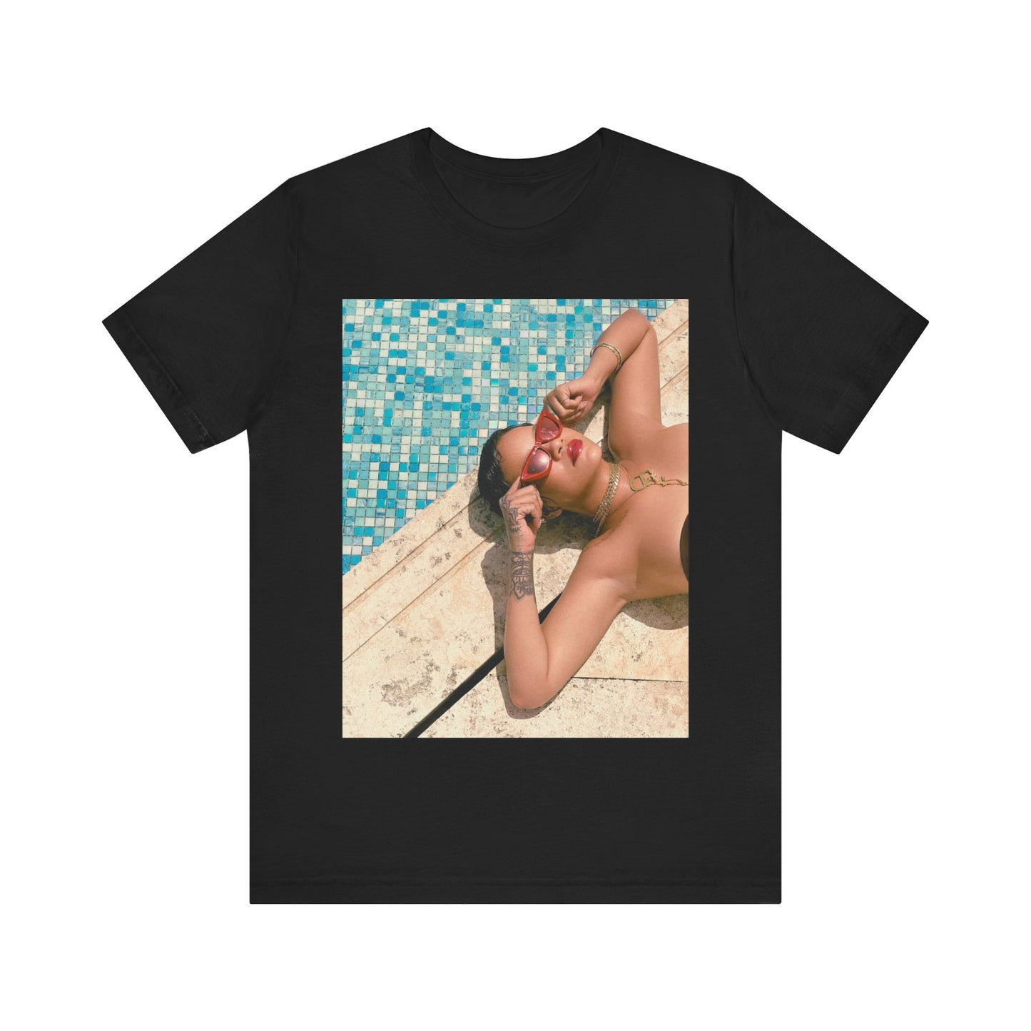 A black graphic t-shirt featuring a graphic of Rihanna in swimwear as a pop star queen.