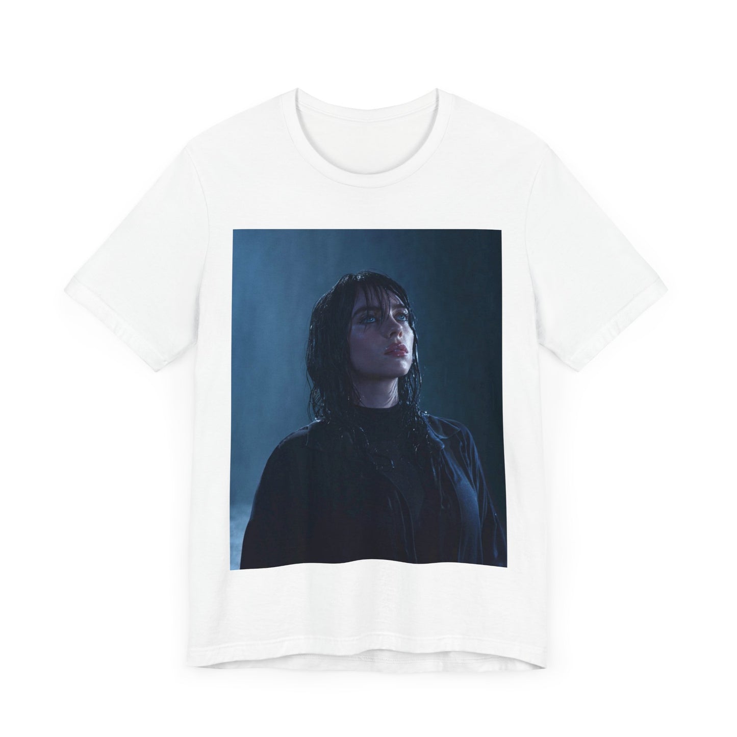 A direct, powerful portrait of Billie Eilish, embodying the 'HIT ME HARD AND SOFT' album era, printed on a graphic t-shirt.