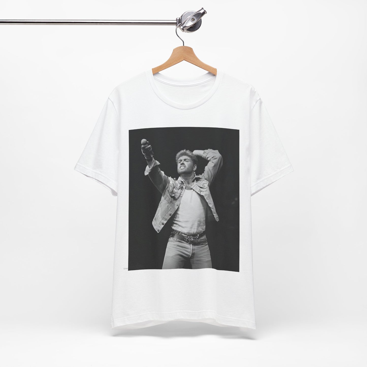 A black graphic t-shirt featuring a graphic or photo of George Michael performing live on stage.