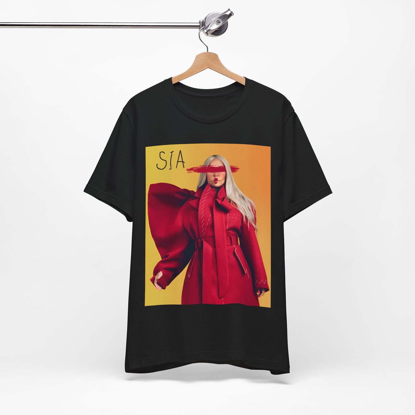 A black graphic t-shirt featuring a retro graphic related to Sia's '1000 Forms of Fear' album era.