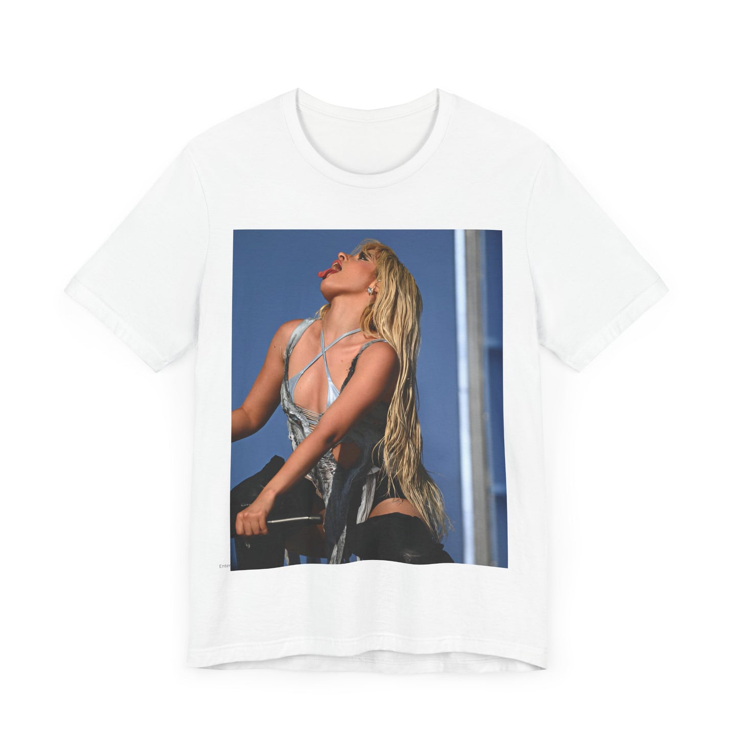 A black graphic t-shirt featuring a dynamic graphic or photo of Camila Cabello performing live on stage.