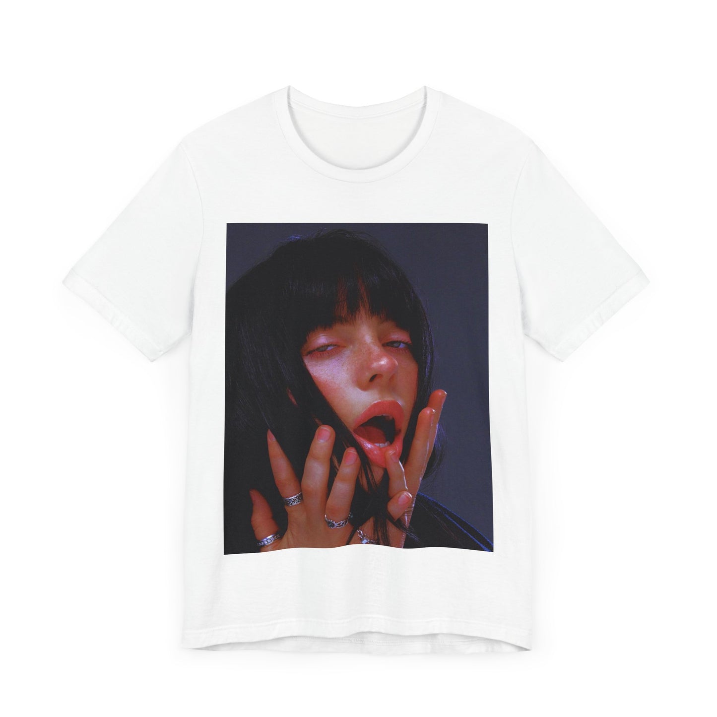 An intense, artistic photo of Billie Eilish with a bloody nose, conveying a sense of raw power, printed on a graphic t-shirt.