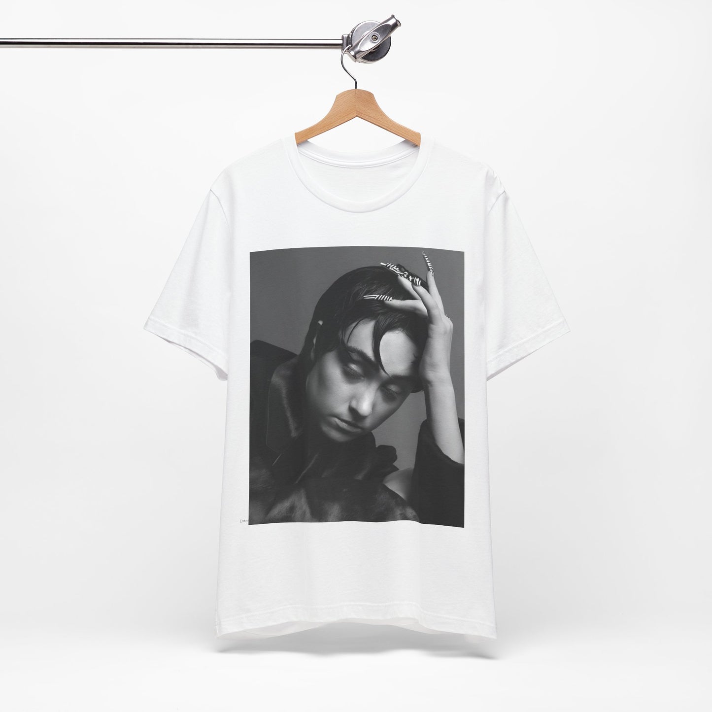 A black graphic t-shirt featuring a black and white graphic of Chappell Roan as a queer pop icon.