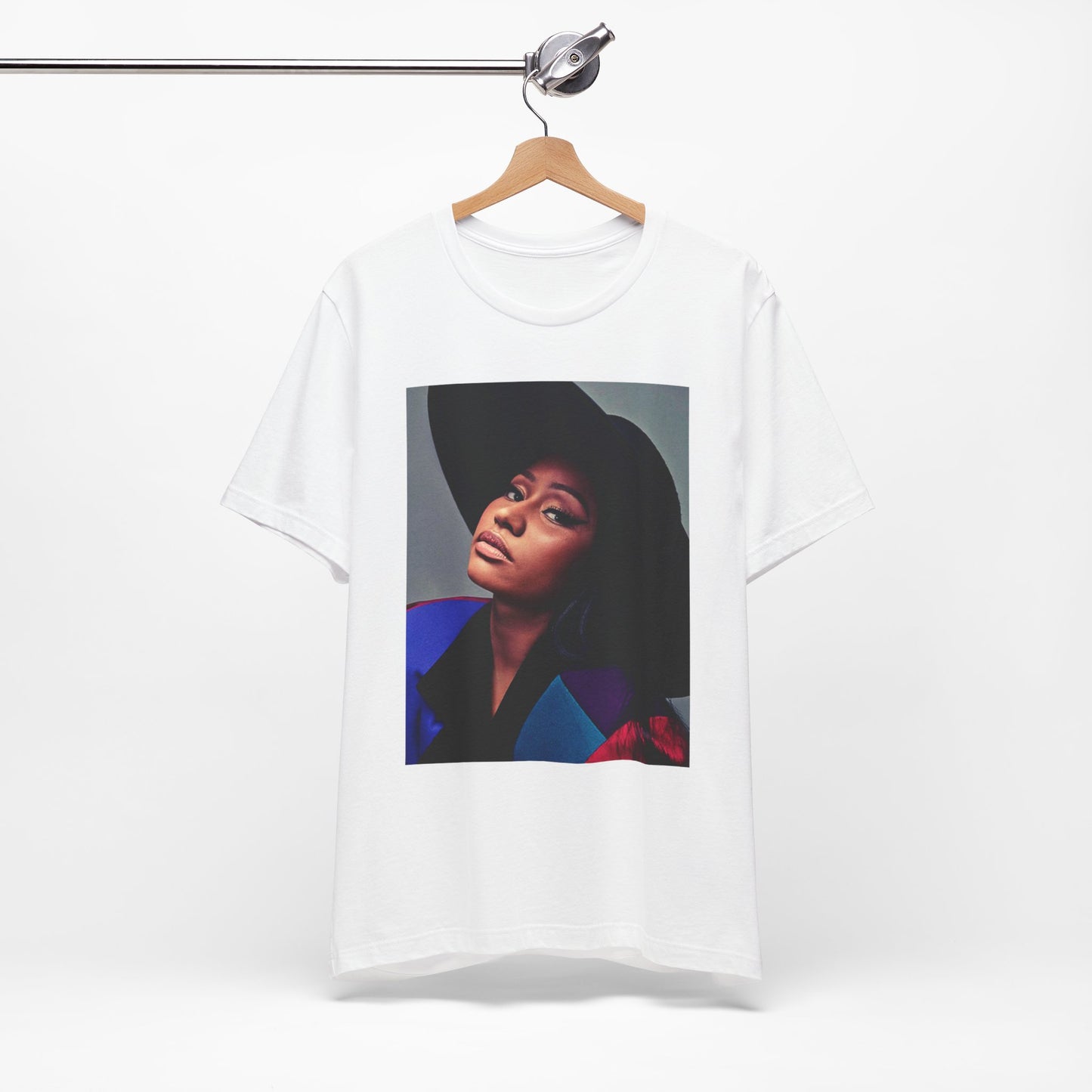 A black graphic t-shirt featuring a graphic of Nicki Minaj as a streetwear icon.
