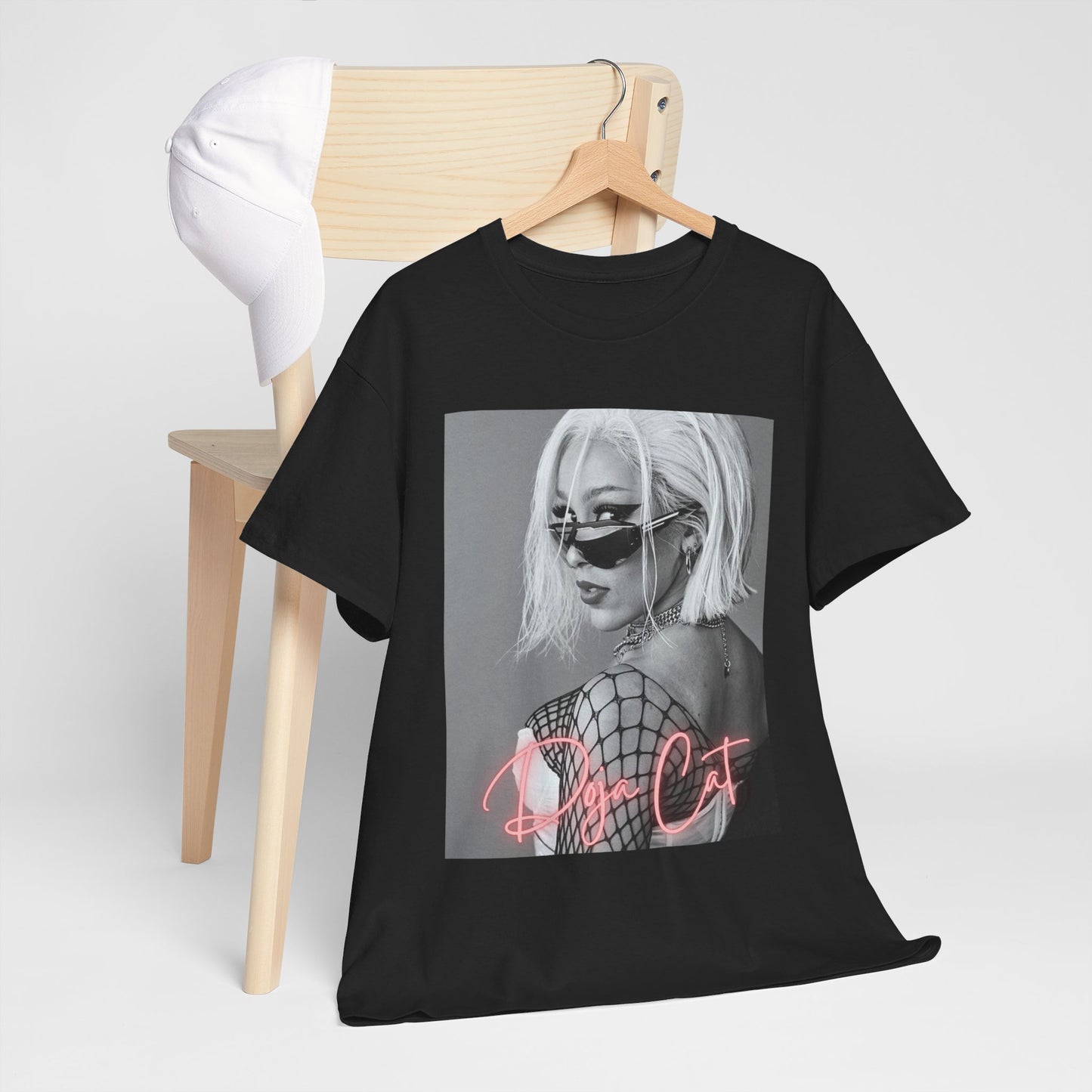 A black graphic t-shirt featuring a black and white portrait photo of Doja Cat.