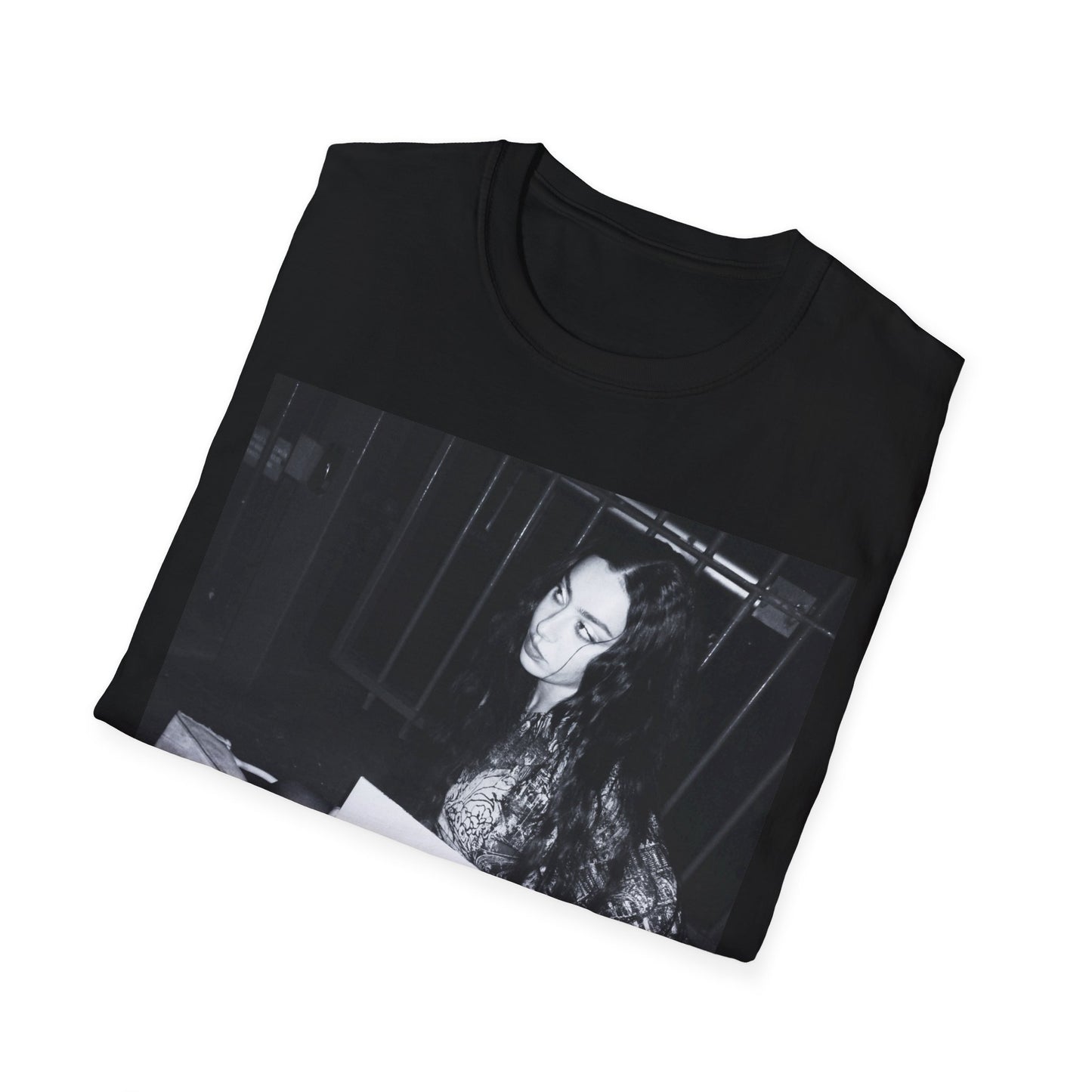 A black graphic t-shirt featuring a graphic related to Charli XCX's 'Brat' album.