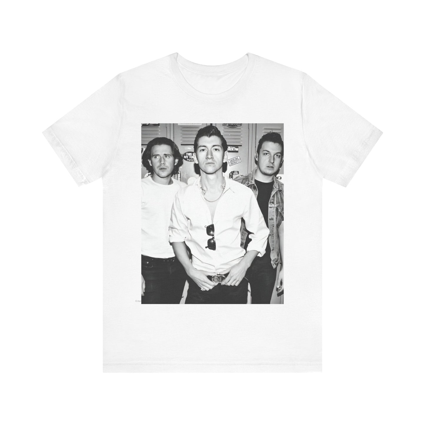 A black graphic t-shirt featuring a vintage-style design related to Arctic Monkeys' 'AM' album era, possibly with the album art or band imagery.