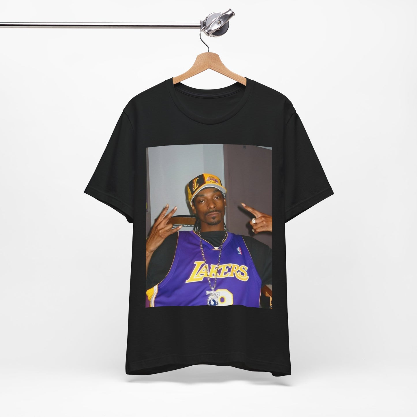A black graphic t-shirt featuring a graphic of Snoop Dogg with Lakers branding or colors.