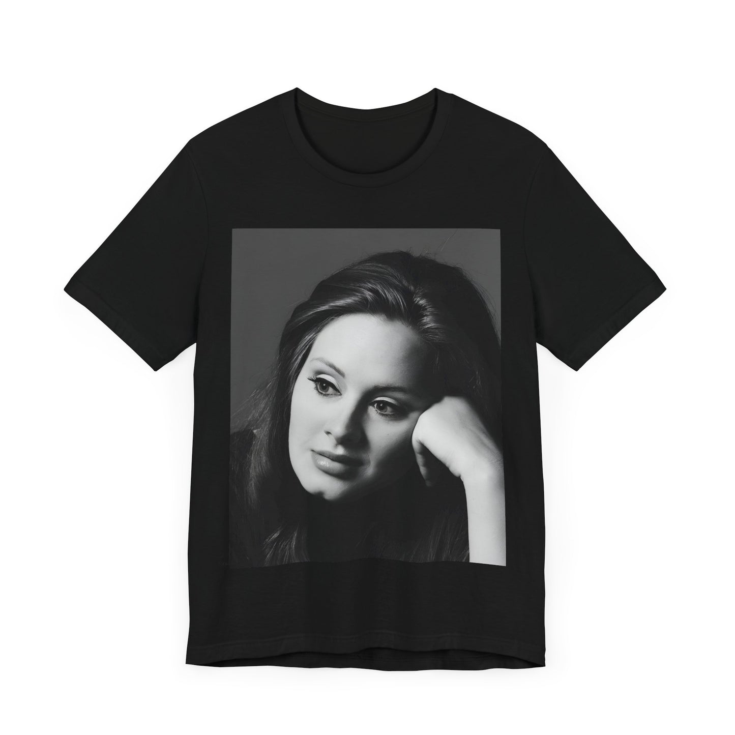 A black graphic t-shirt featuring a vintage-style black and white studio portrait of Adele, showing her with a poised and elegant expression.