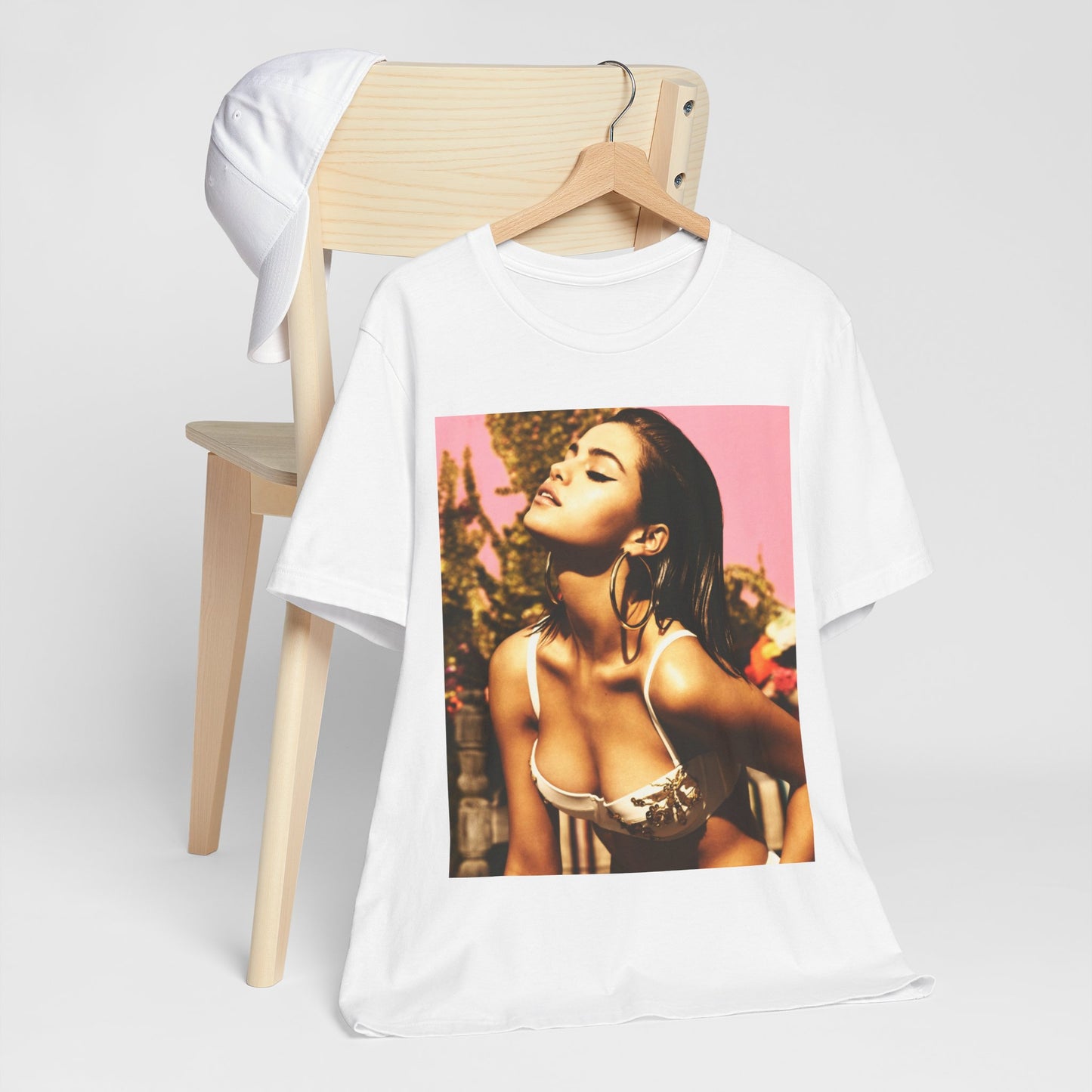 A black graphic t-shirt featuring a graphic of Selena Gomez emphasizing her timeless beauty.