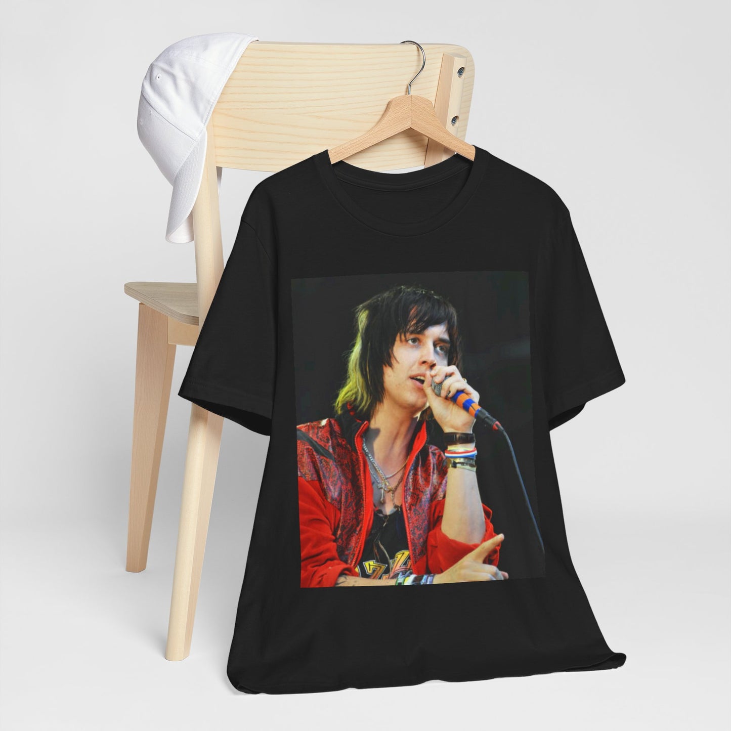 A black graphic t-shirt featuring a vintage indie rock graphic of The Strokes.