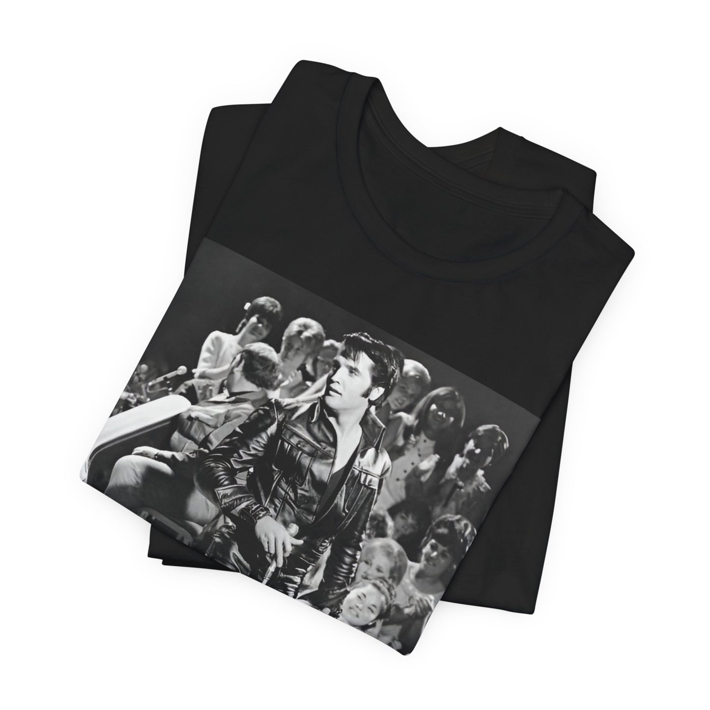 A black graphic t-shirt featuring a vintage black and white photo or graphic of Elvis Presley performing live on stage.