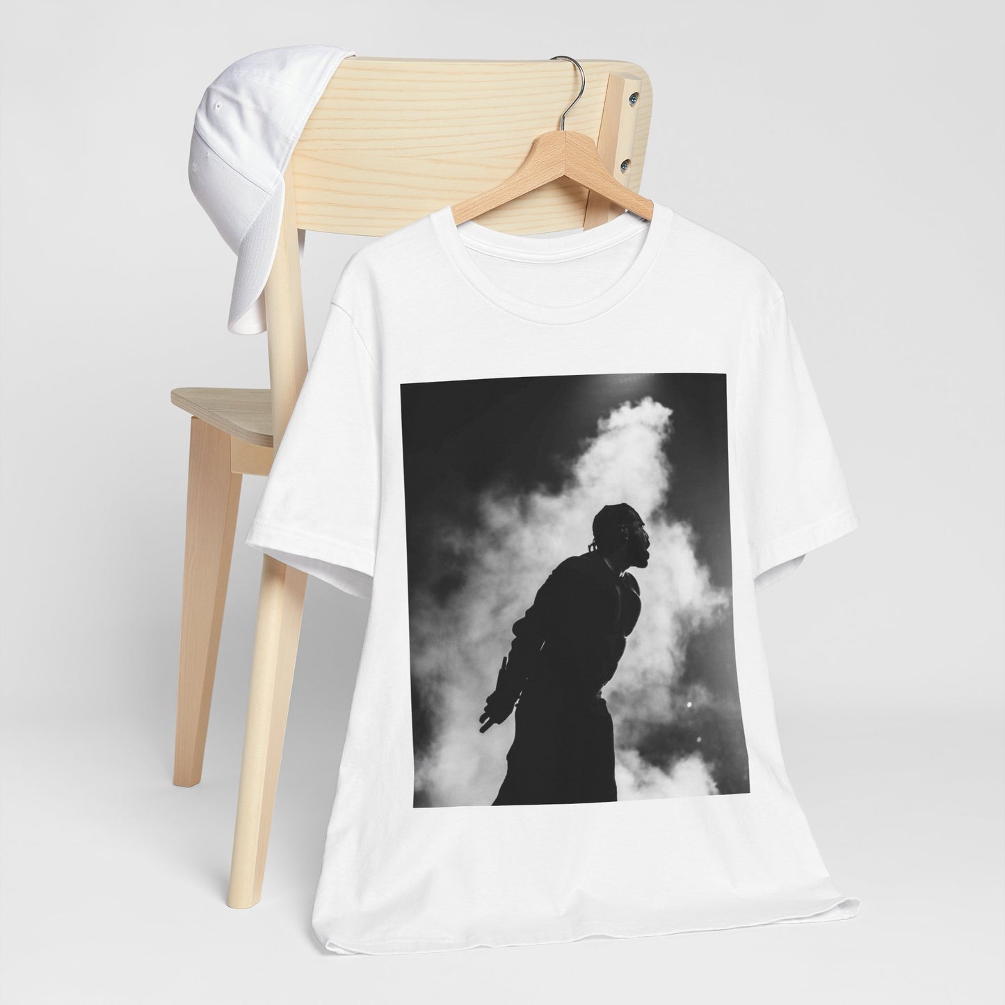 A black graphic t-shirt featuring a timeless black and white graphic or photo portrait of Drake.