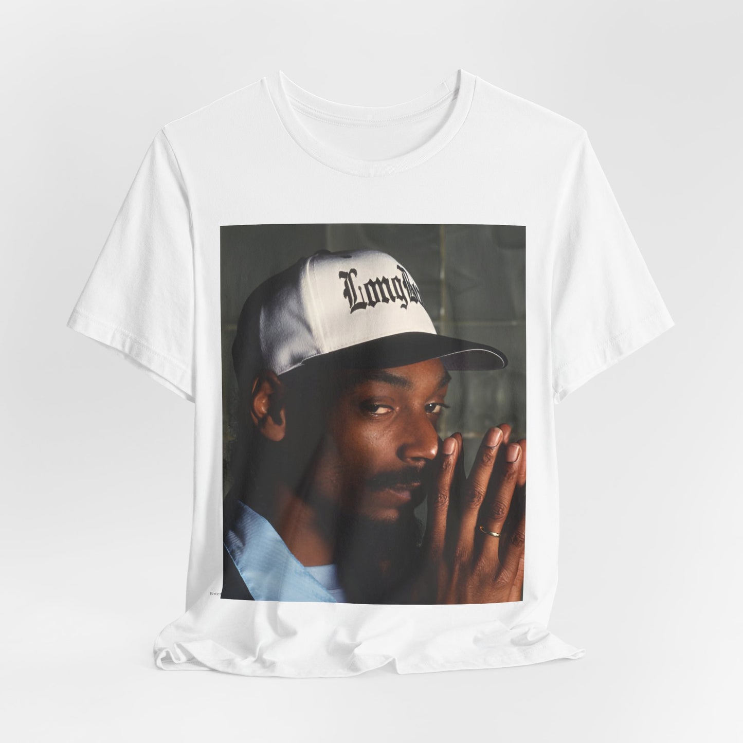 A black graphic t-shirt featuring a graphic of Snoop Dogg with a boxy 'Doggfather' vibe.