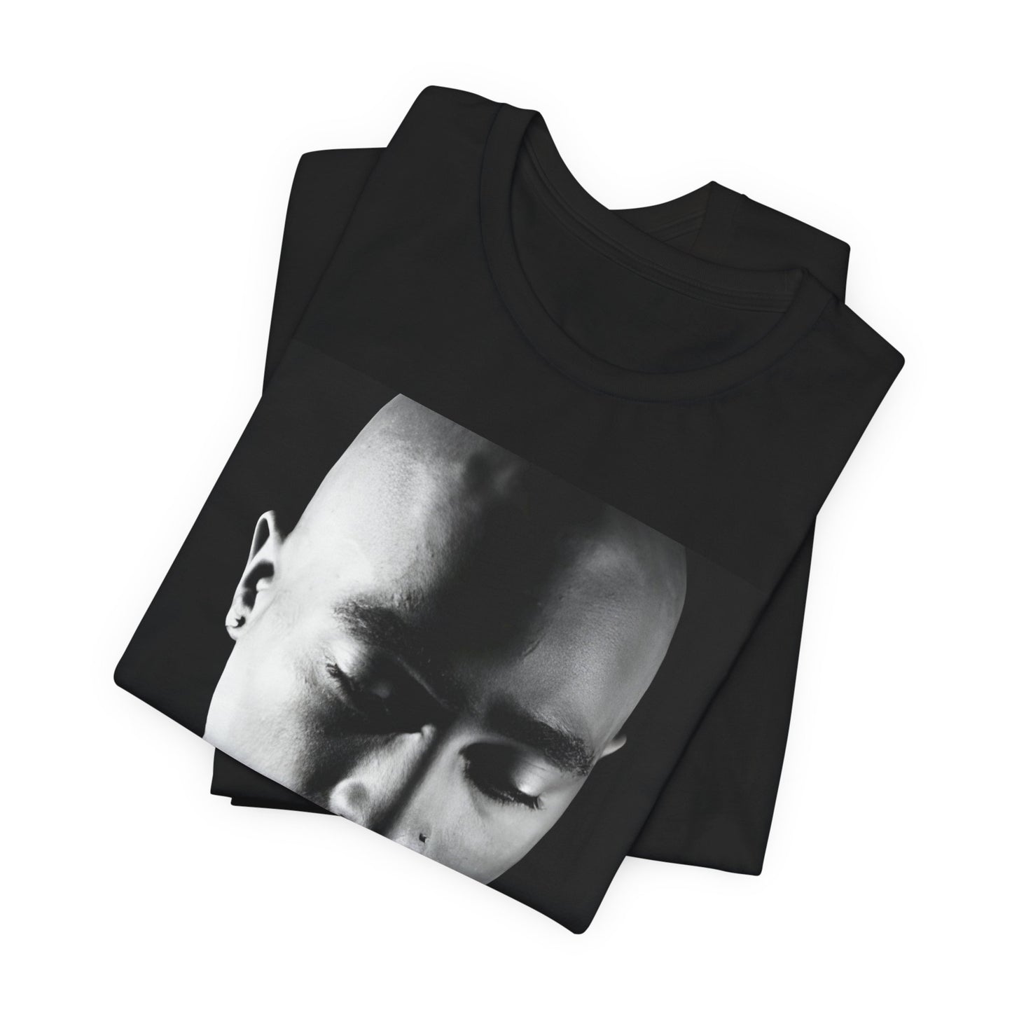 A black graphic t-shirt featuring a black and white streetwear rebel graphic of Tupac.
