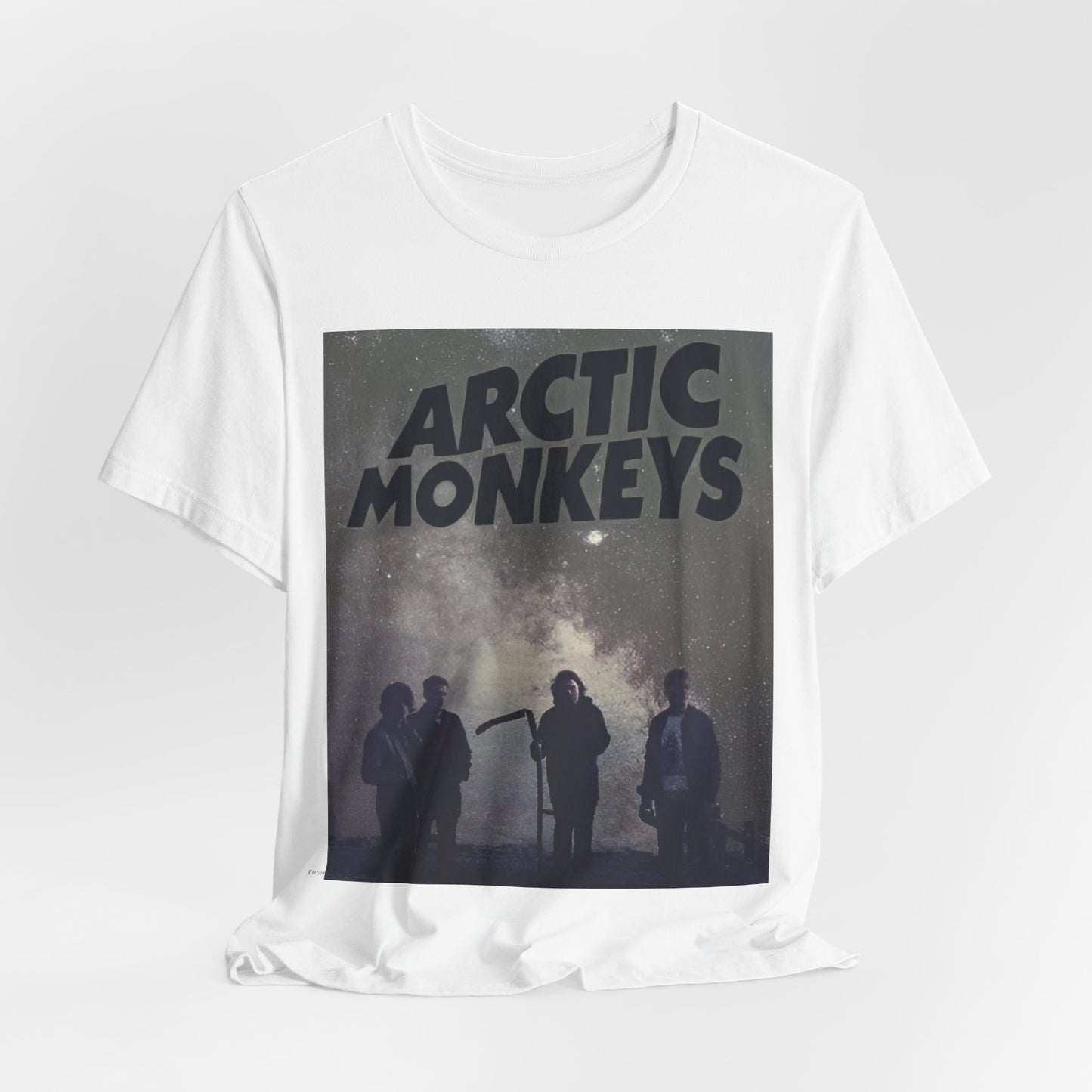 A black graphic t-shirt featuring an artistic or aesthetic graphic of the Arctic Monkeys band.