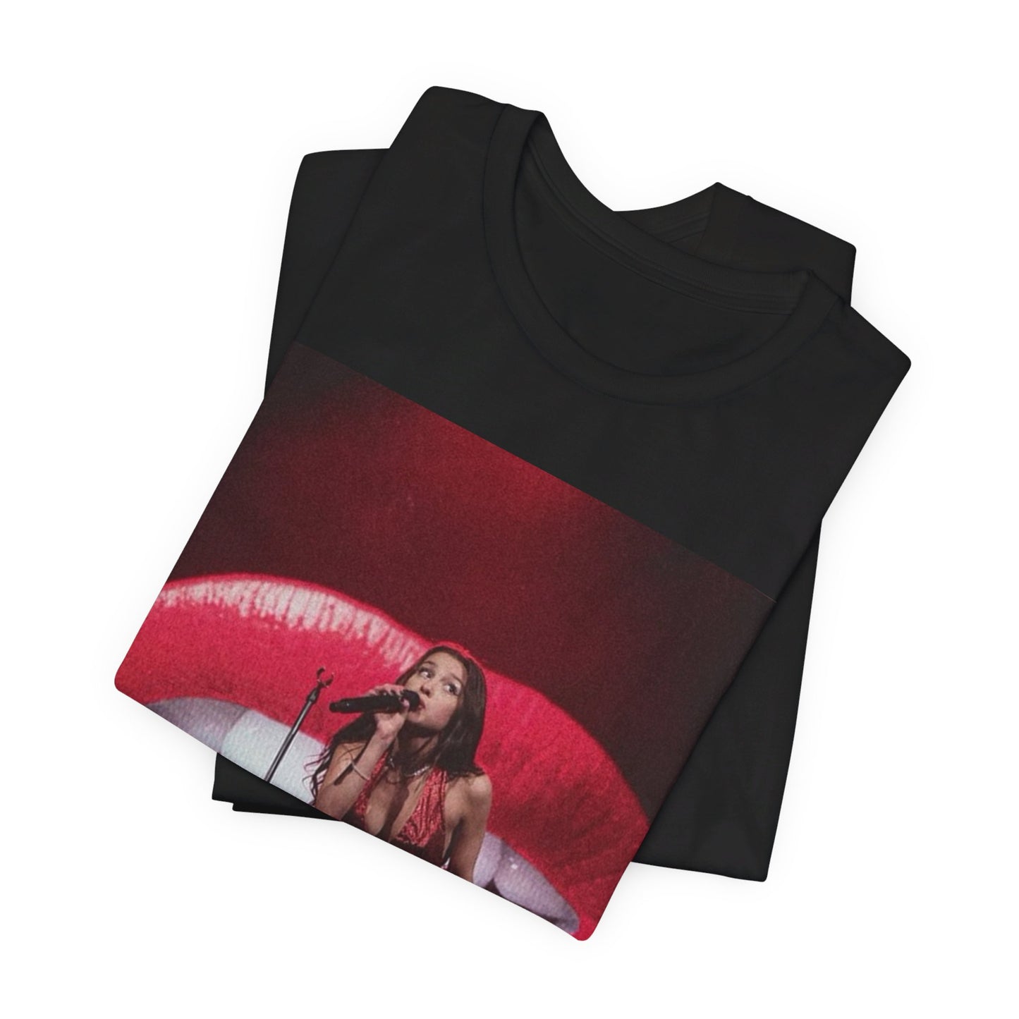 A black graphic t-shirt featuring a graphic or photo of Olivia Rodrigo performing live.