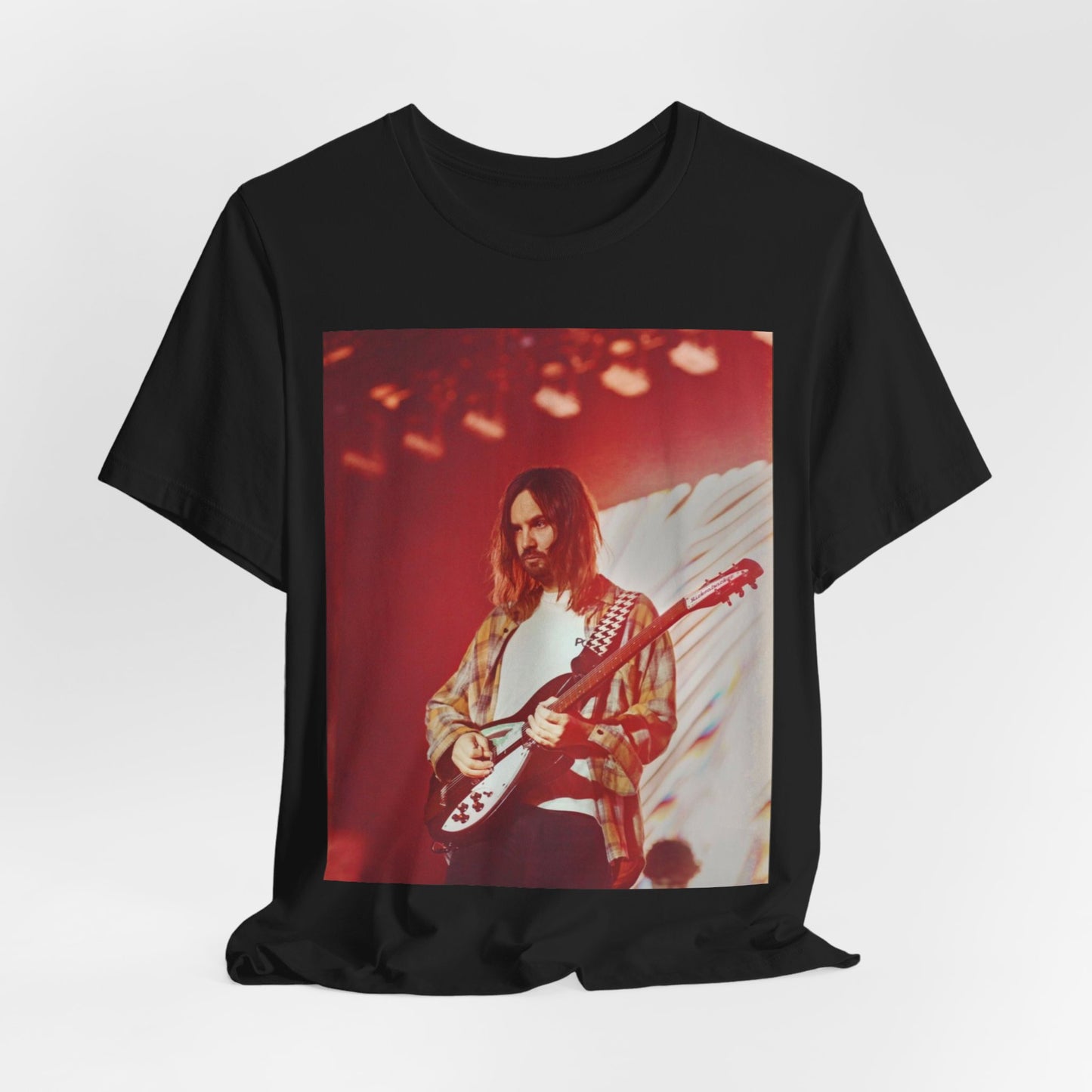 A black graphic t-shirt featuring a cool psychedelic journey graphic of Tame Impala.