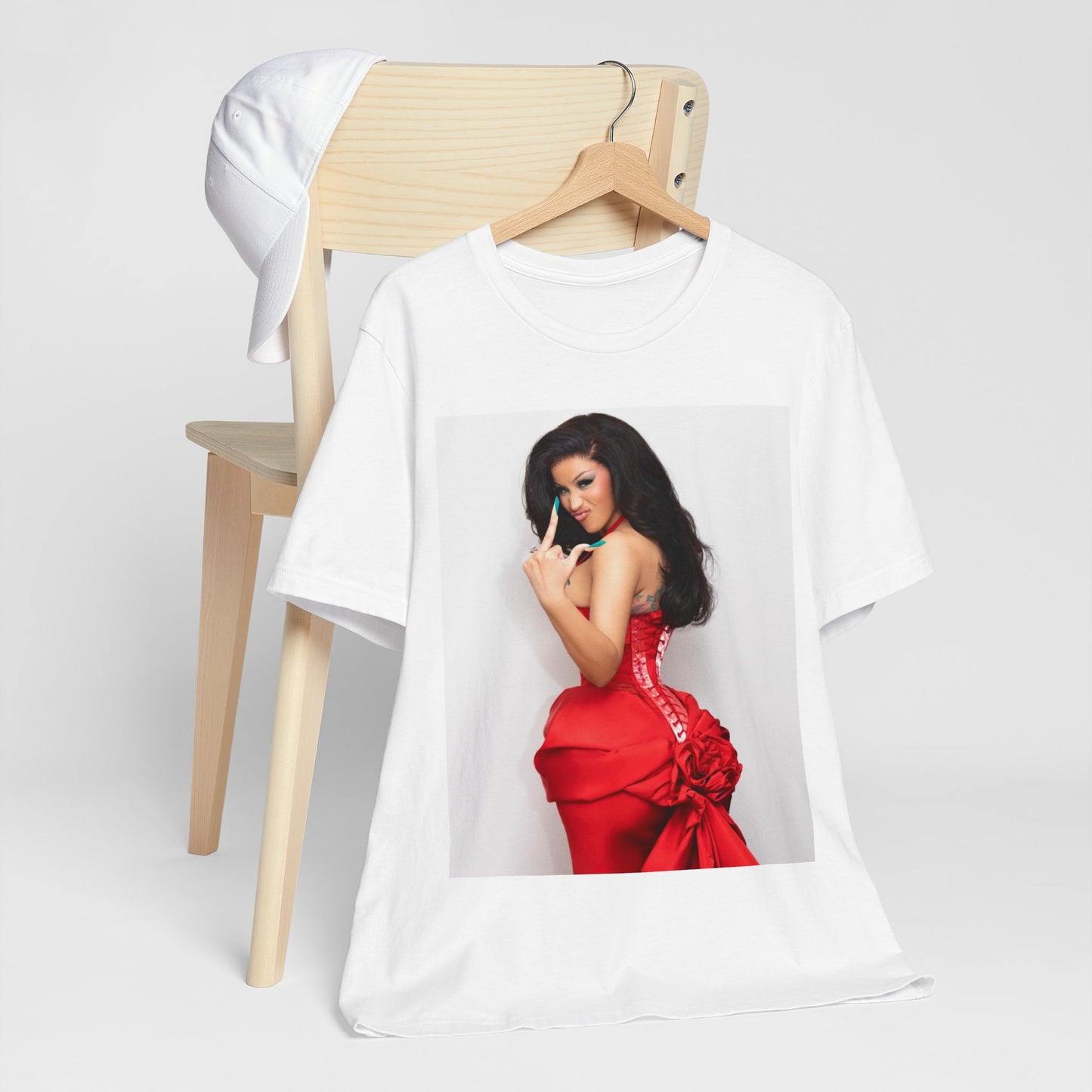 A black graphic t-shirt featuring a graphic of Cardi B making 'the finger' gesture.