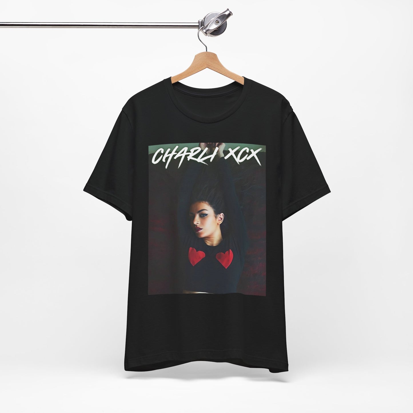 A black graphic t-shirt featuring a graphic of Charli XCX, designed with a future pop diva aesthetic.