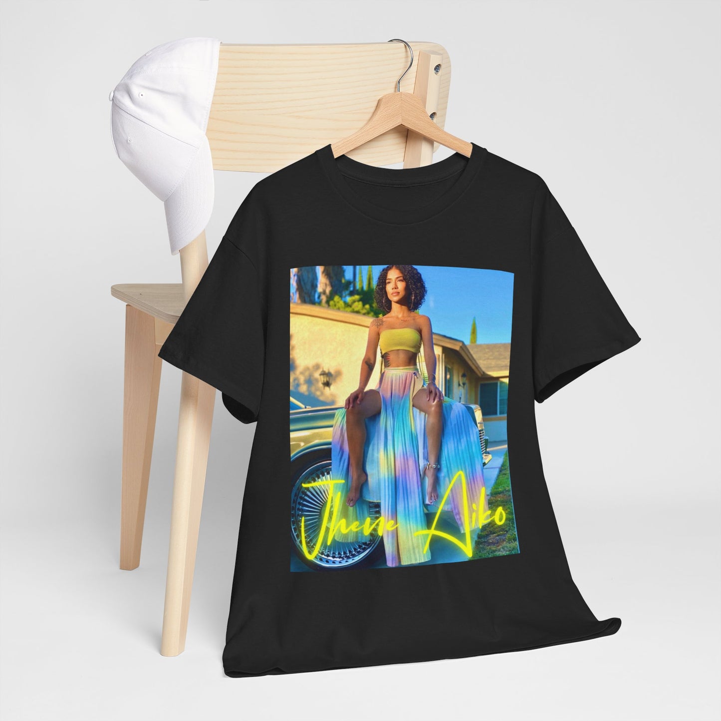 A black graphic t-shirt featuring a retro R&B aesthetic graphic of Jhene Aiko.