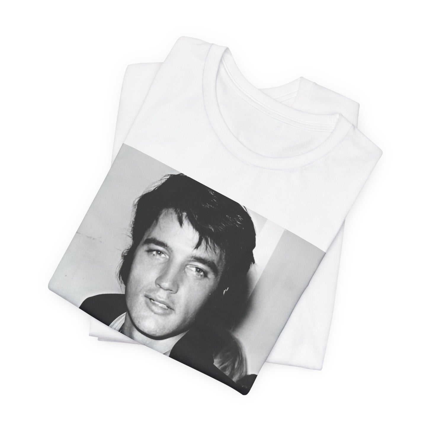 A black graphic t-shirt featuring a black and white rock and roll portrait photo of Elvis Presley.