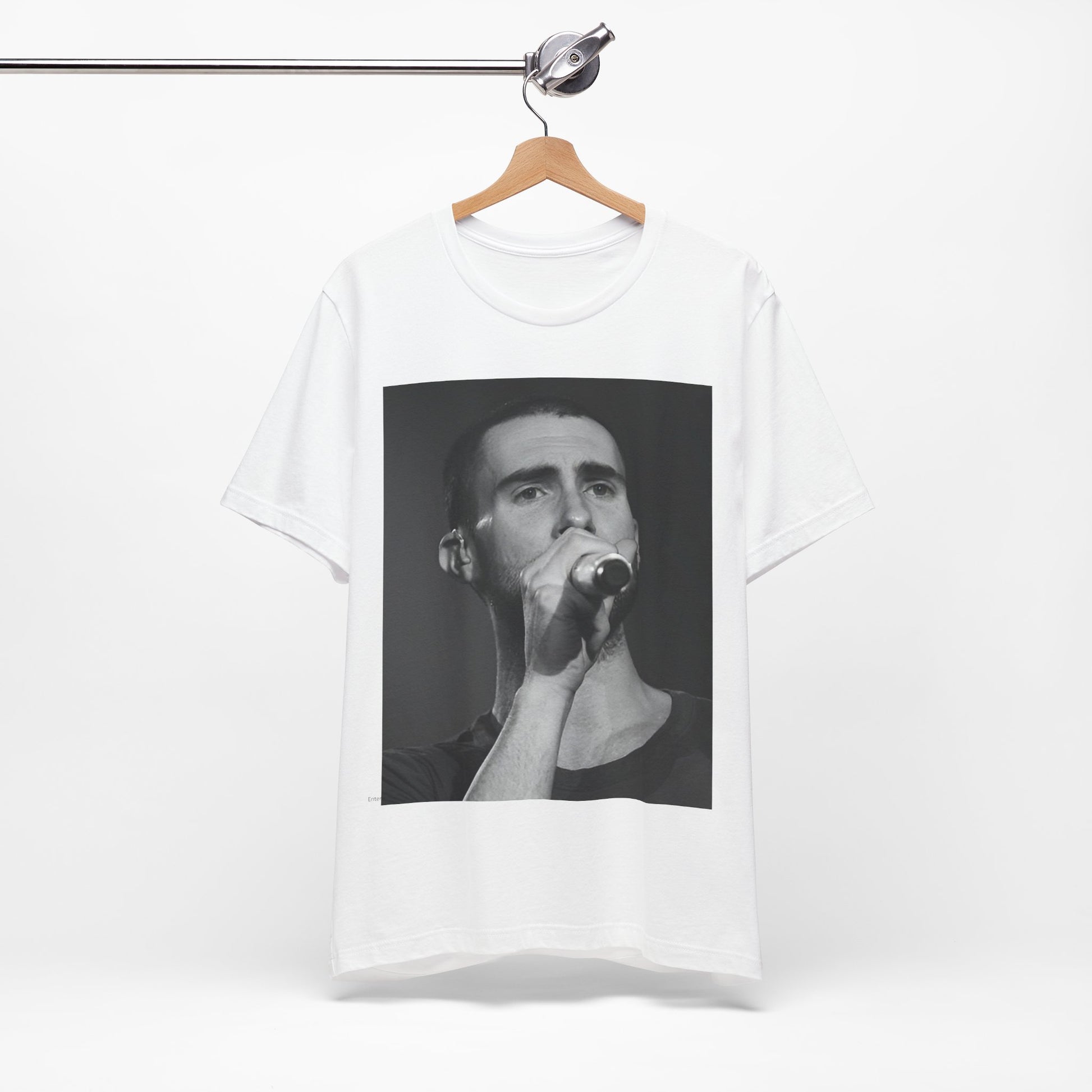 A rare, vintage black and white photo of a very young Maroon 5, from their early garage band days, printed on a t-shirt.