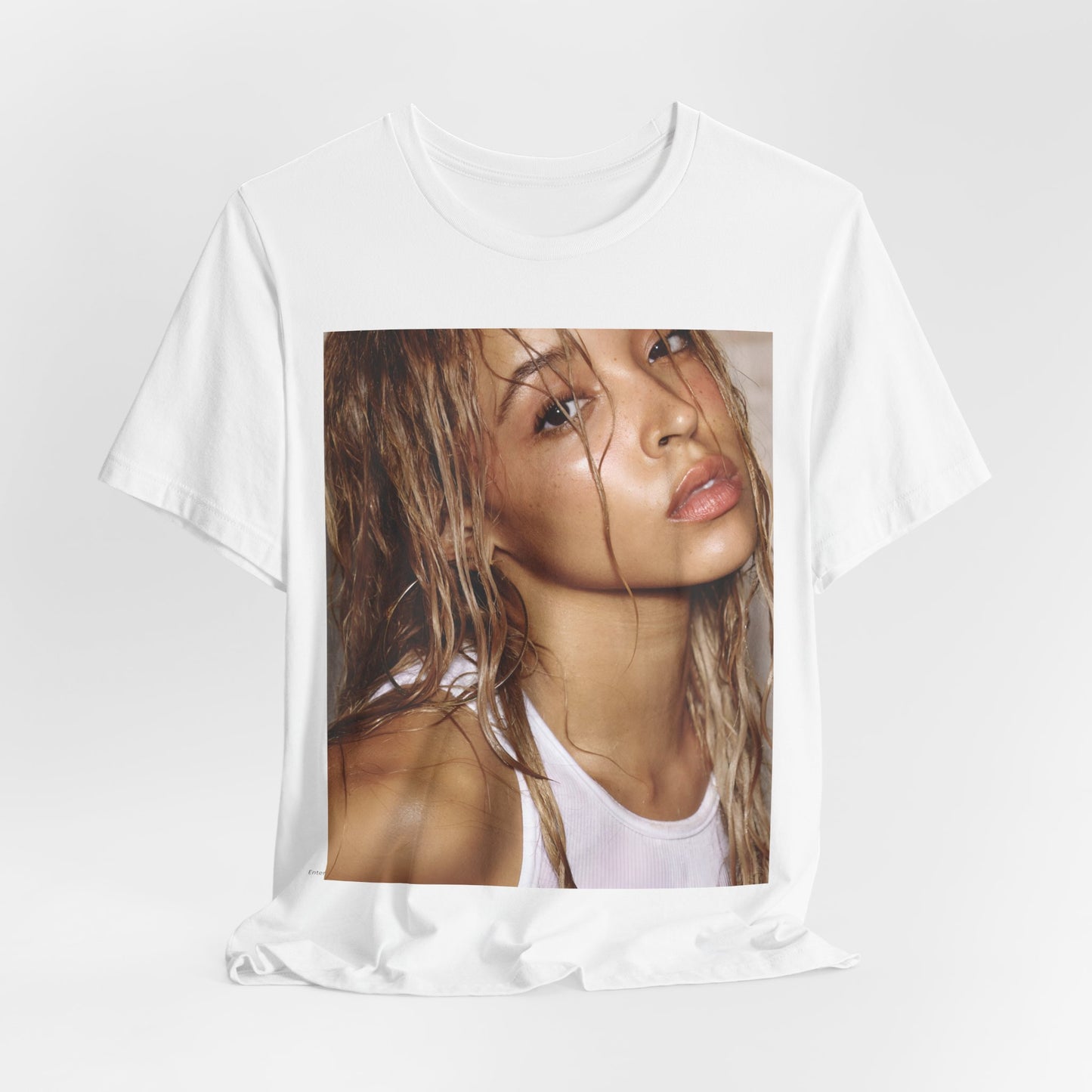 A black graphic t-shirt featuring a nostalgic indie R&B vibes graphic of Tinashe.