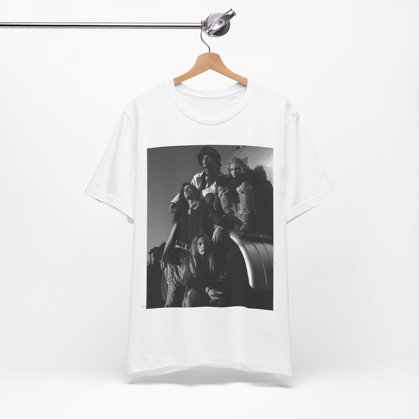 A black graphic t-shirt featuring a 90s black and white photographic portrait of the band Alice In Chains, capturing their iconic grunge look.
