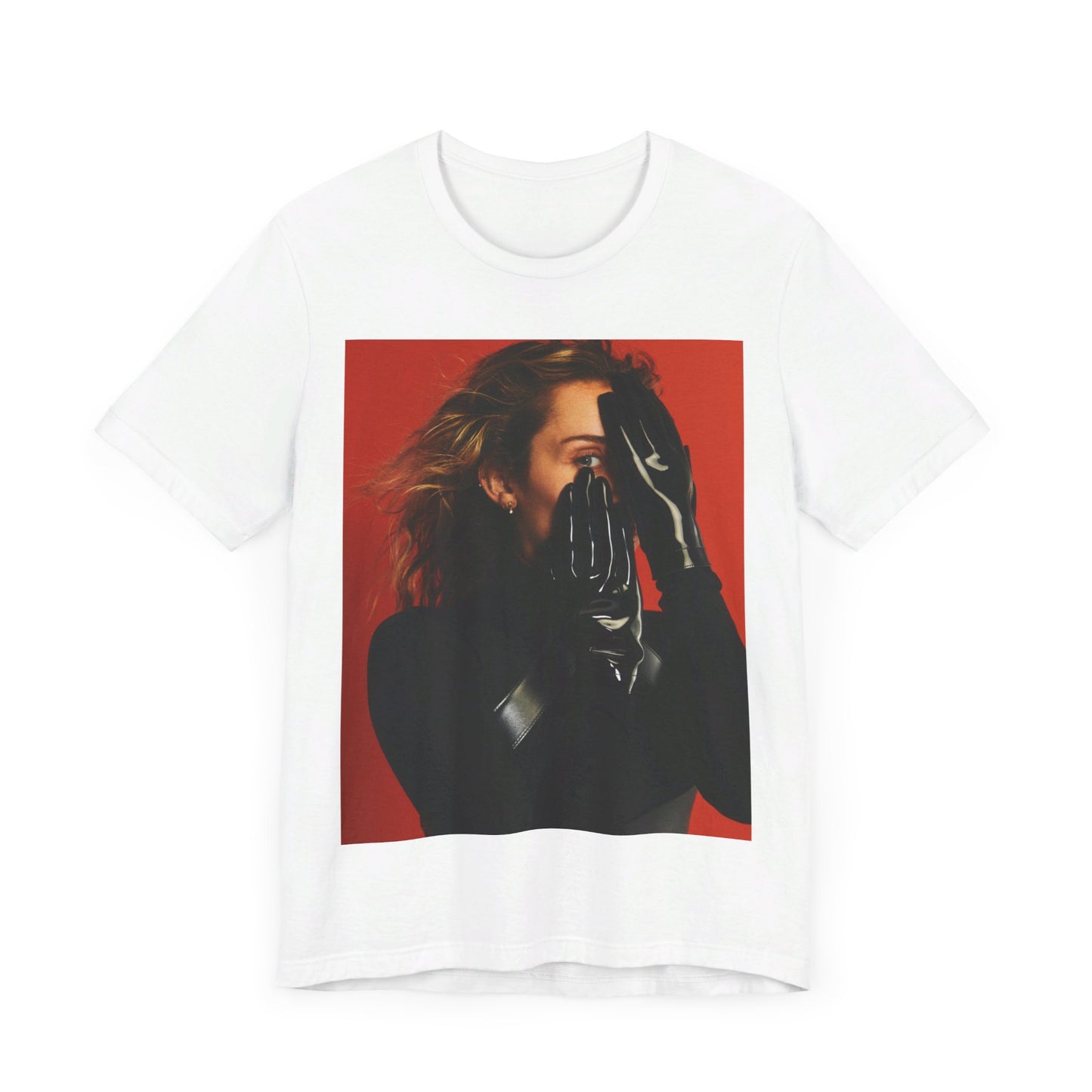 A black graphic t-shirt featuring a graphic of Miley Cyrus with Nashville or country music elements.