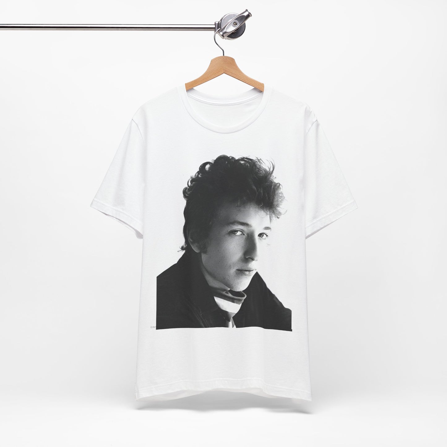 A black graphic t-shirt featuring a graphic related to Bob Dylan's 'Like a Rolling Stone' song or era.