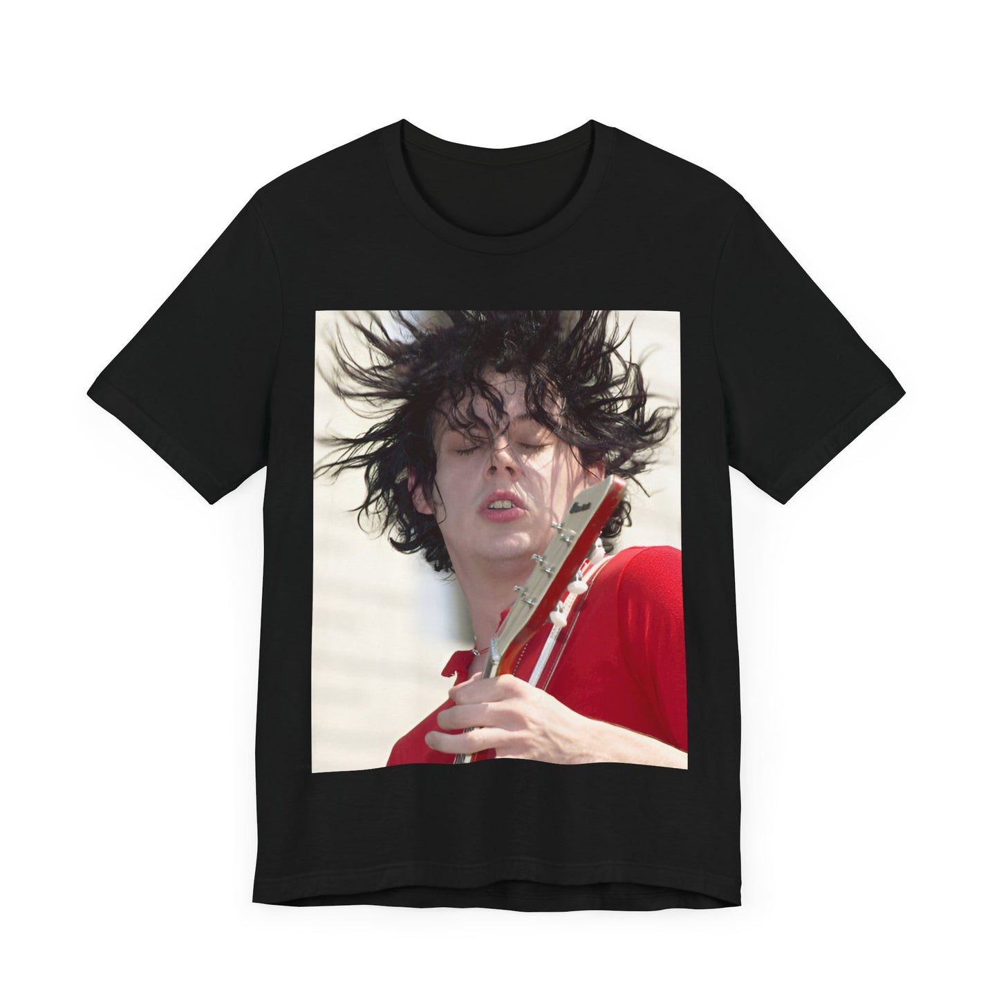 A black graphic t-shirt featuring a retro graphic of Jack White from The White Stripes playing guitar.