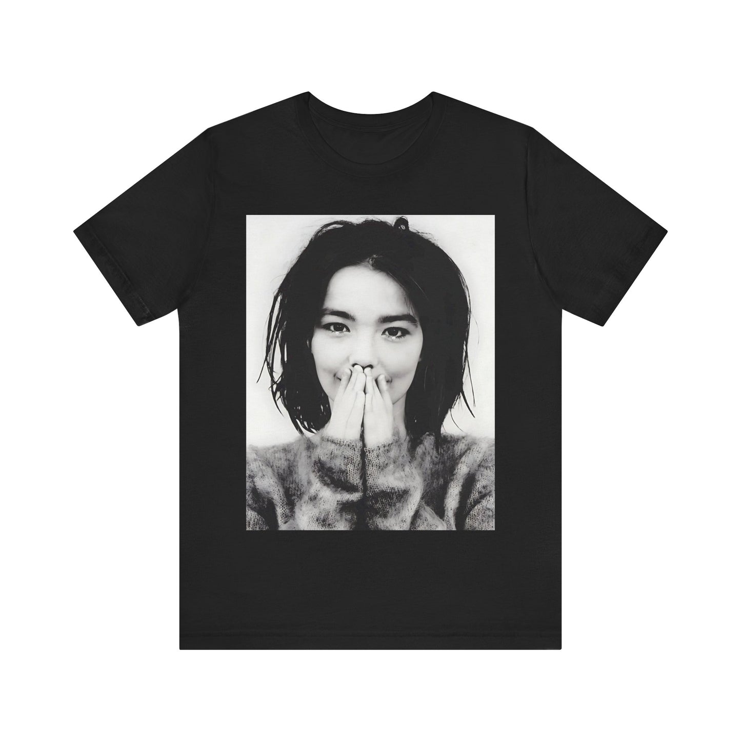 A black graphic t-shirt featuring a 90s black and white photographic portrait of Bjork.