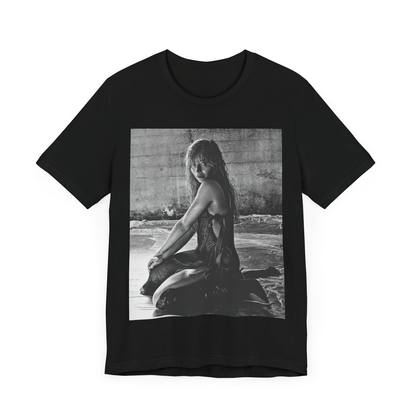 A black graphic t-shirt featuring a black and white, monochrome graphic or photo of Sabrina Carpenter.