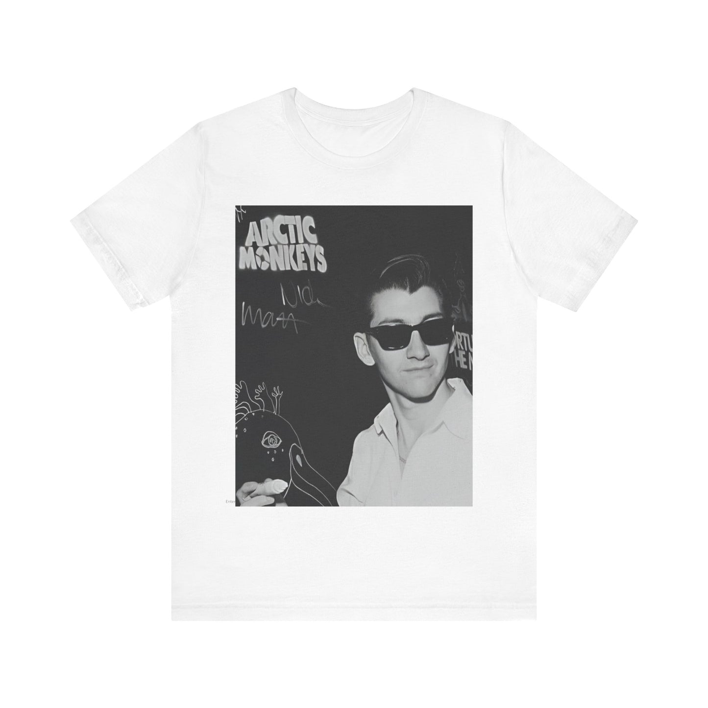 A black graphic t-shirt featuring a black and white portrait photo of Alex Turner from Arctic Monkeys, showing his signature look.