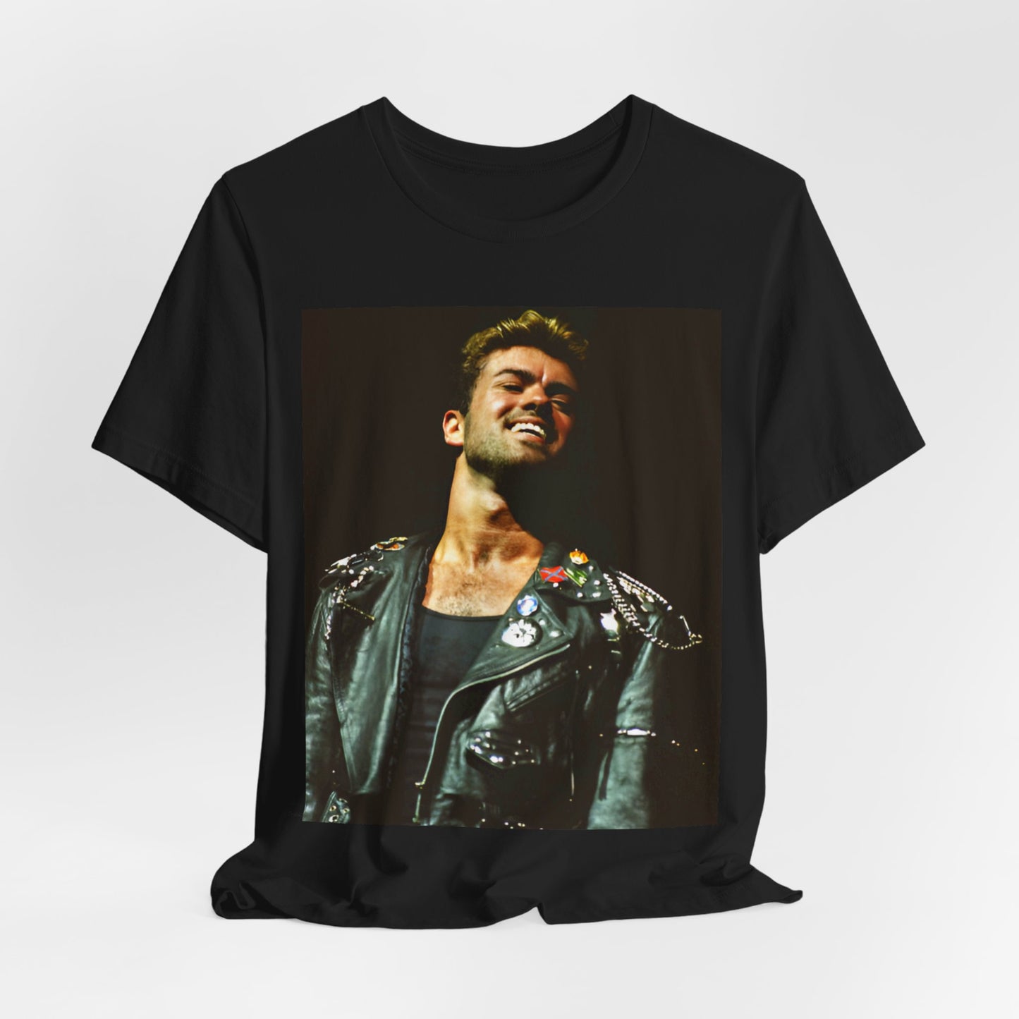A black graphic t-shirt featuring a graphic related to George Michael's 'Careless Whisper' song or era.