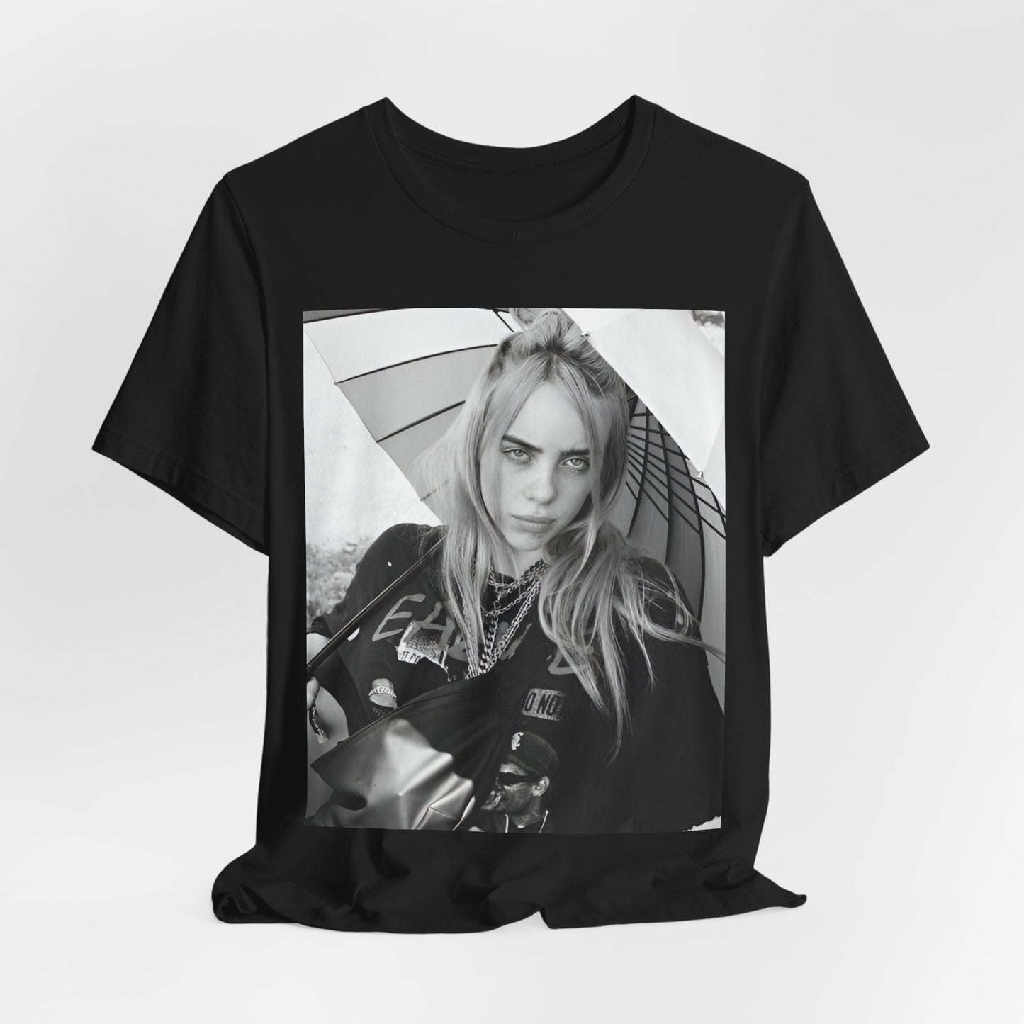 A graphic t-shirt inspired by the colorful and iconic music video for "Bad Guy" by Billie Eilish.