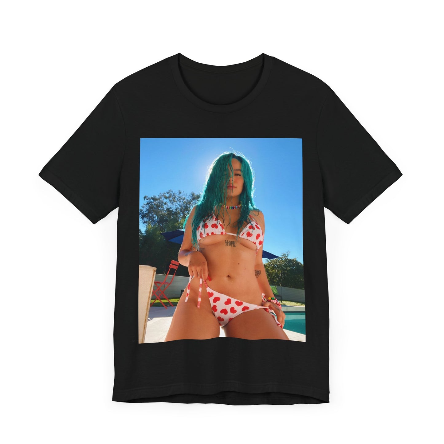 A black graphic t-shirt featuring a graphic of Karol G with sensual vibes.