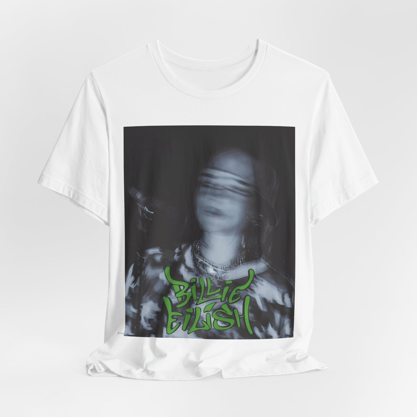 A photo of Billie Eilish in a classic 'anti-popstar' pose, with a bored expression and slouchy streetwear, printed on a graphic t-shirt.