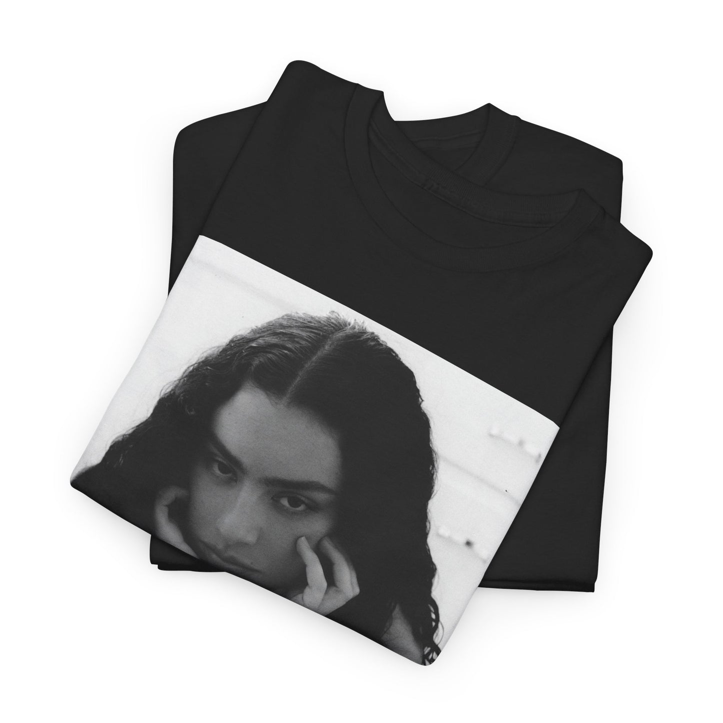A black graphic t-shirt featuring a black and white, monochrome graphic or photo of Charli XCX.