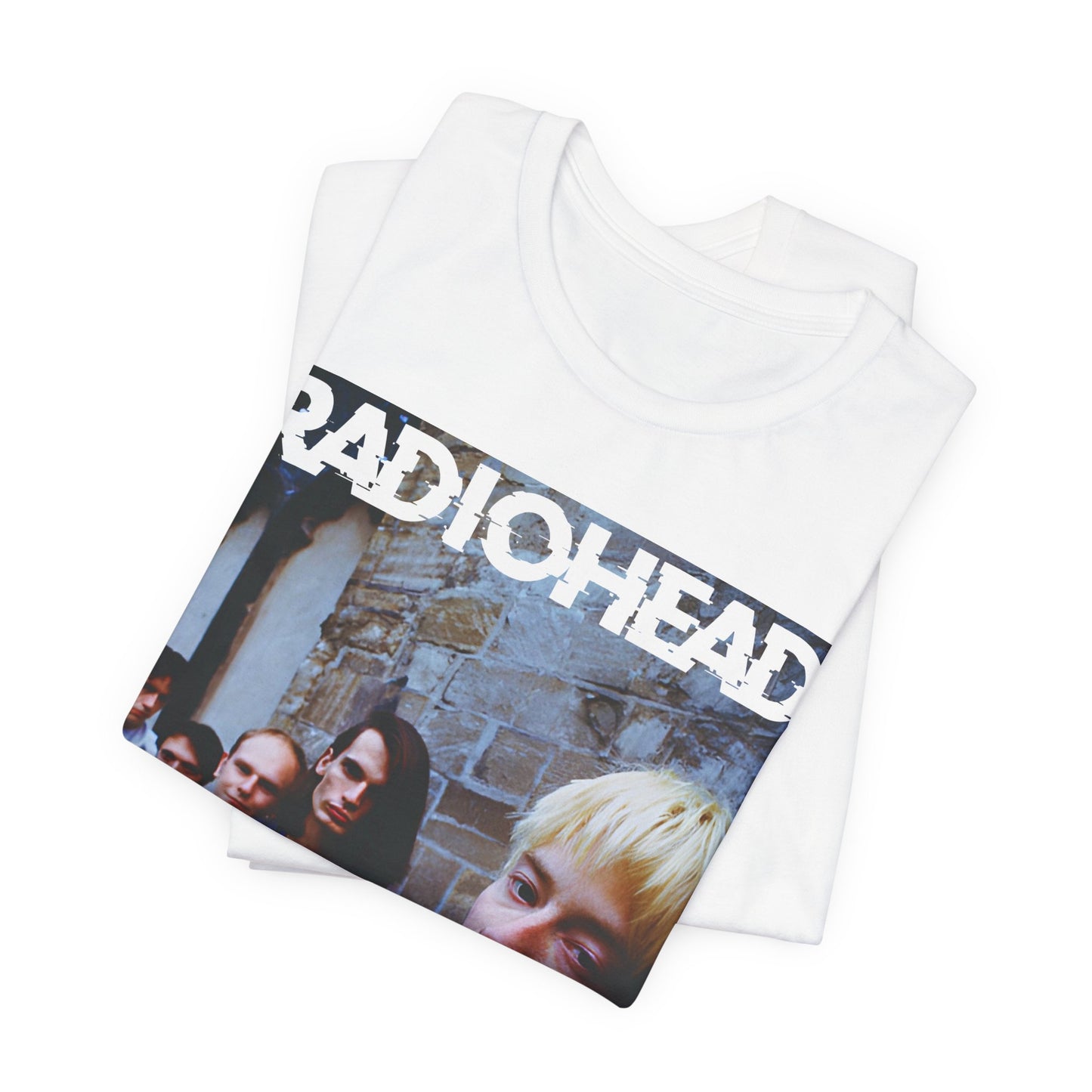 A black graphic t-shirt featuring a 90s graphic related to Radiohead's 'Karma Police' song or era.