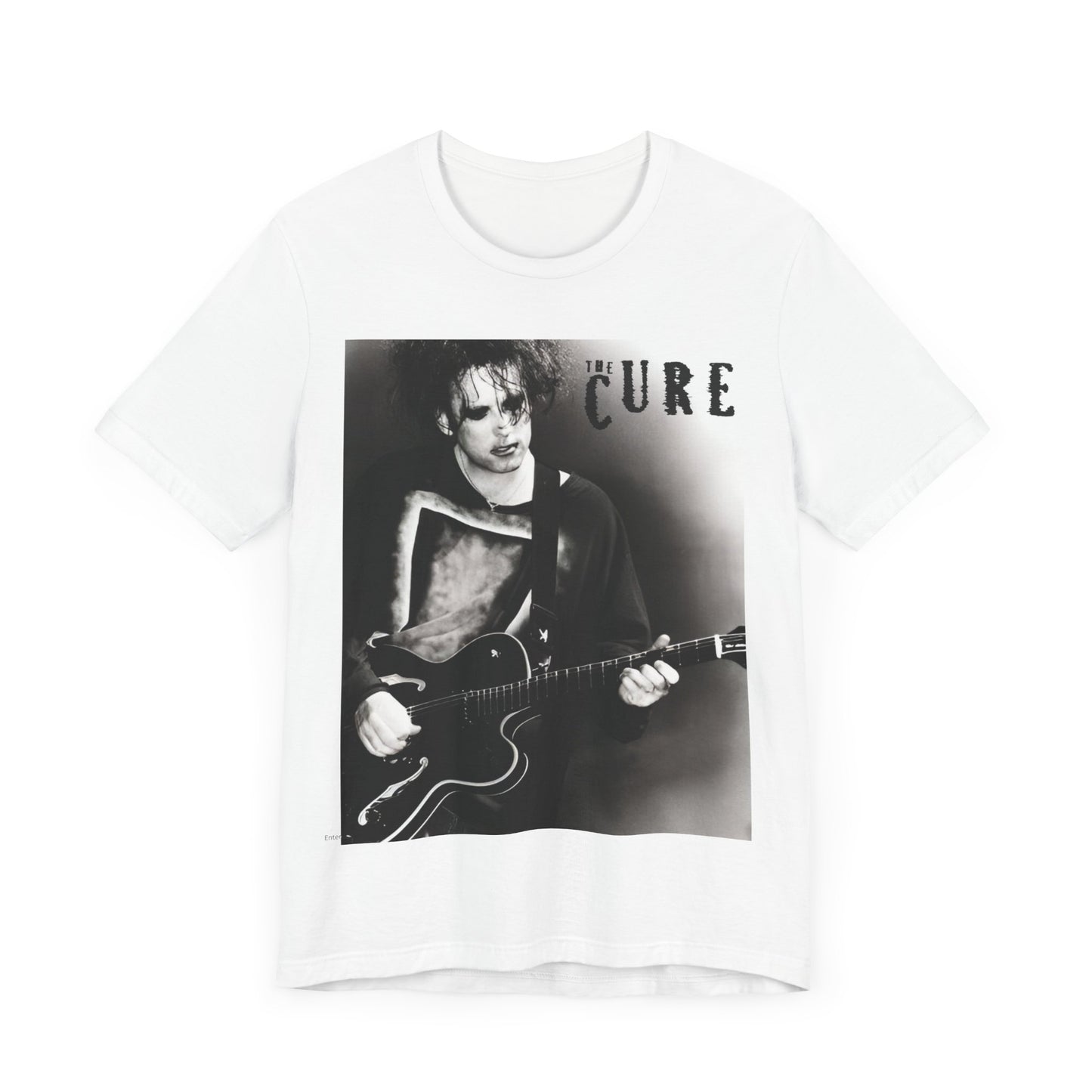 A black graphic t-shirt featuring a vintage goth rock graphic of The Cure.