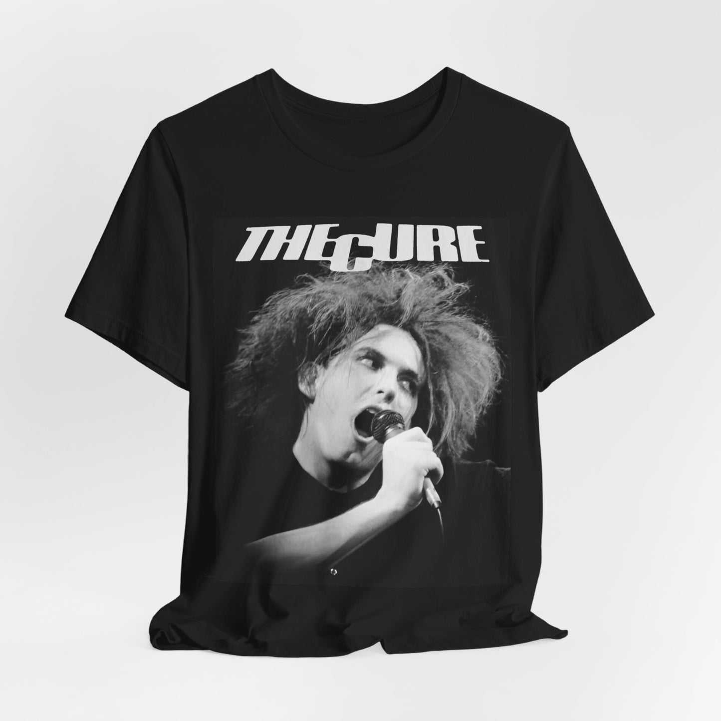 A black graphic t-shirt featuring a graphic of The Cure with a dark romanticism core aesthetic.