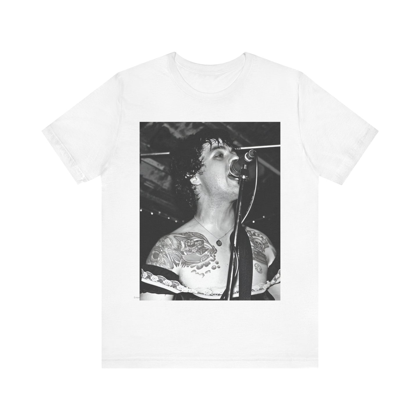 A black graphic t-shirt featuring a black and white graphic or photo of Green Day performing live on stage.